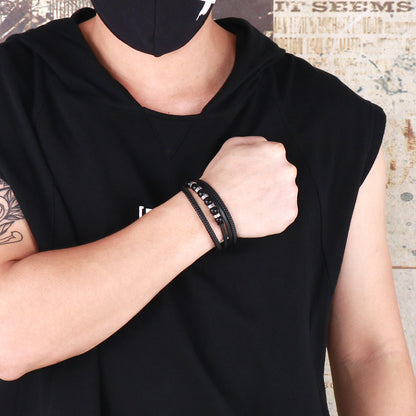 Mehrlagiges schwarzes Lederarmband mit Edelstahl-Akzenten – Handgeflochtener Unikatschmuck