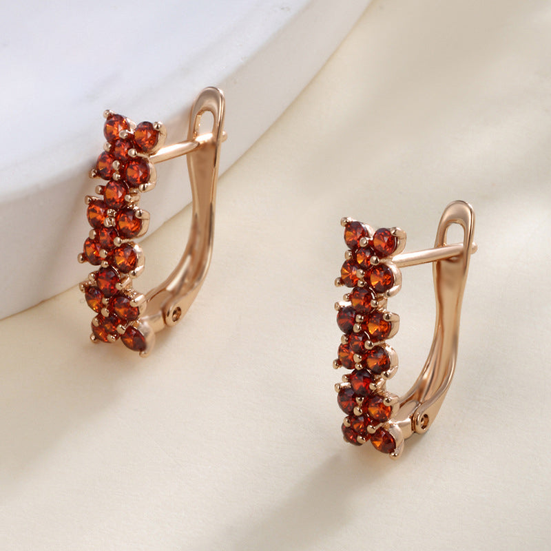 Blütenförmige Ohrclips mit Granat-Zirkonia - 18K vergoldete Kupferlegierung (Höhe 1.5 cm)